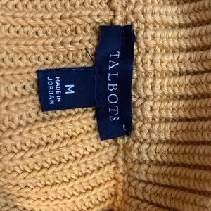 Chunky golden sweater with wide neck